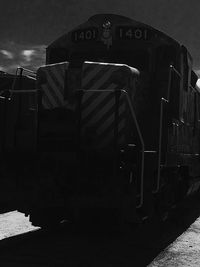 Cars moving on railroad track against sky