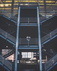 Low angle view of man standing in balcony