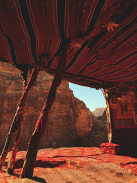 Tent against rock formation