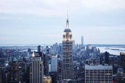 Modern buildings in city against sky