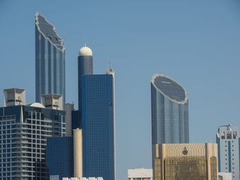 Modern buildings against blue sky