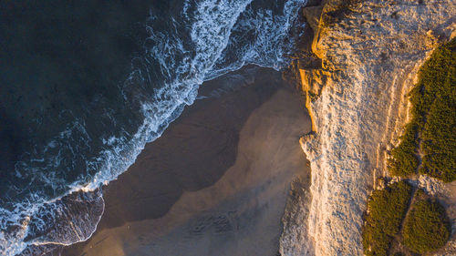 Aerial view of beach during sunset