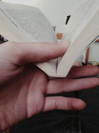 Close-up of hand holding mirror