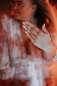 Cropped image of woman looking away