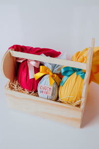 High angle view of multi colored basket on white background