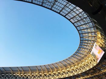 Low angle view of modern building against blue sky