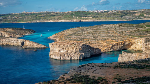 Scenic view of bay against sky