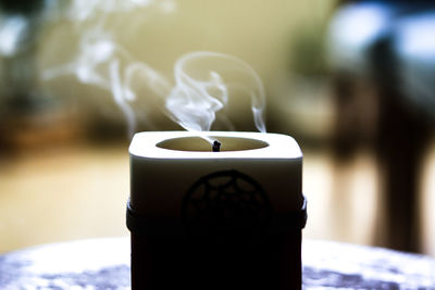 Close-up of coffee cup on table