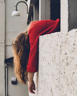 Woman lying on balcony