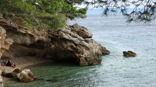 Scenic view of rocks in sea