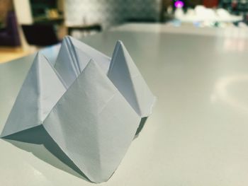 Close-up of paper on table