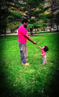 Full length of girl playing in park