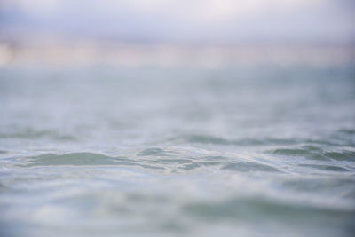 Surface level of sea against sky