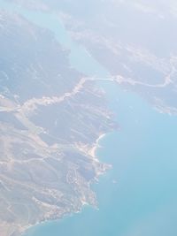 Aerial view of mountains against sky