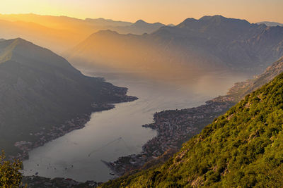 Scenic view of mountains against sky during sunset