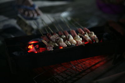 Close-up of meat on barbecue grill