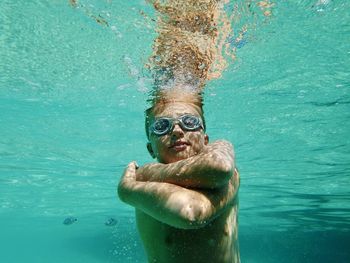 Man swimming in sea