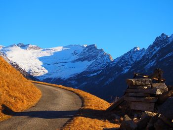 View of mountain range against blue sky