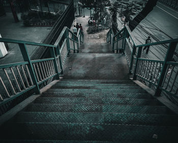 High angle view of people walking on footbridge