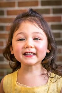 Close-up portrait of smiling girl