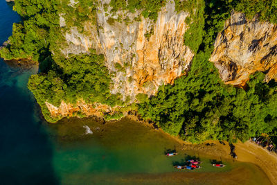 High angle view of people on rock formation