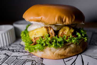 Close-up of burger in plate on table