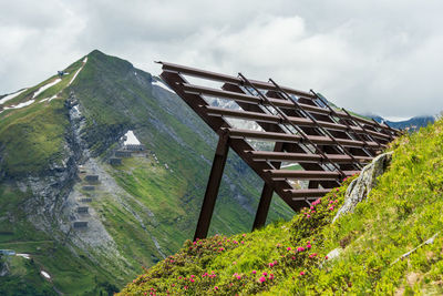 Avalanche protection fences in the alpine mountains. steel snow bridges and sliding snow stands. 