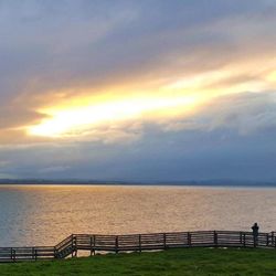 Scenic view of sea at sunset