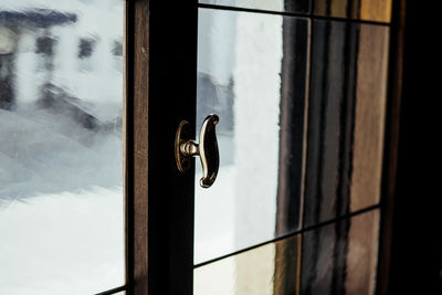 Close-up of closed window at home