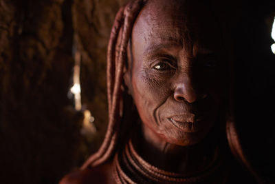 Portrait of an old himba traditional woman, oncocua, angola