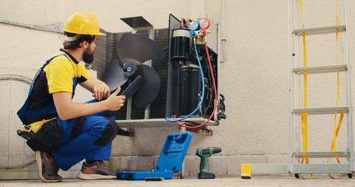 Side view of man working at construction site