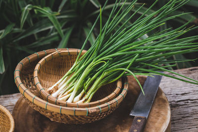 High angle view of vegetables in basket on table