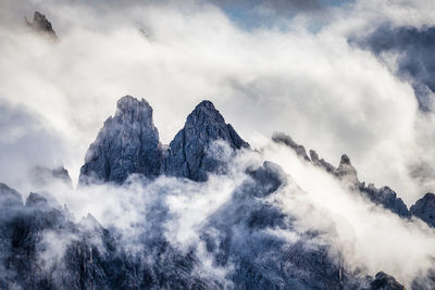 Low angle view of majestic mountain against sky