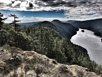 View of calm lake against mountain range