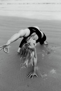 Full length of woman on beach