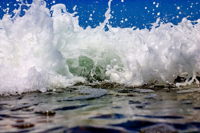 Close-up of wave splashing on shore
