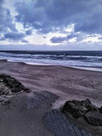 Scenic view of beach against sky