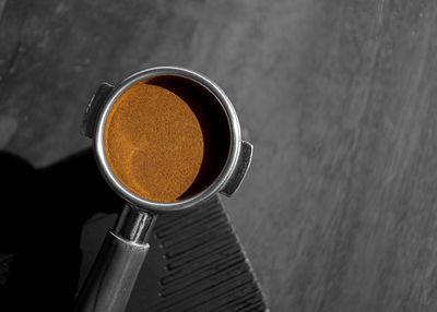High angle view of coffee cup on table