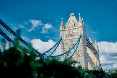 Low angle view of tower bridge against sky