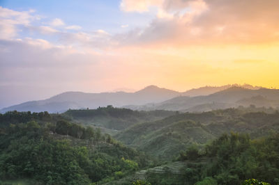 Scenic view of mountains against sky during sunset