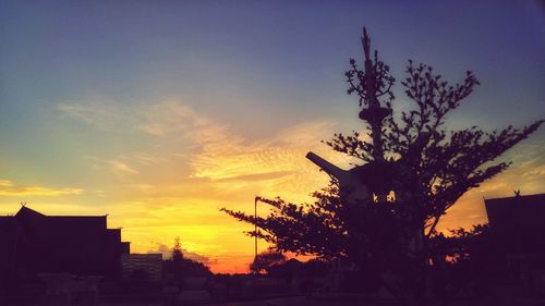 Silhouette tree against sky during sunset