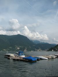 Boats moored in sea