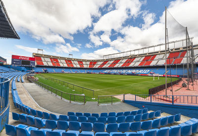 Scenic view of soccer field against sky