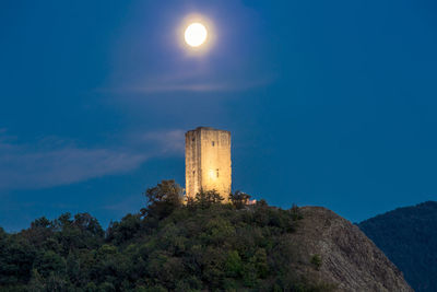 Scenic view of rossena tower on top of the rock against new moon, canossa, reggio emilia, parma