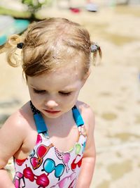 Close-up of cute girl on beach