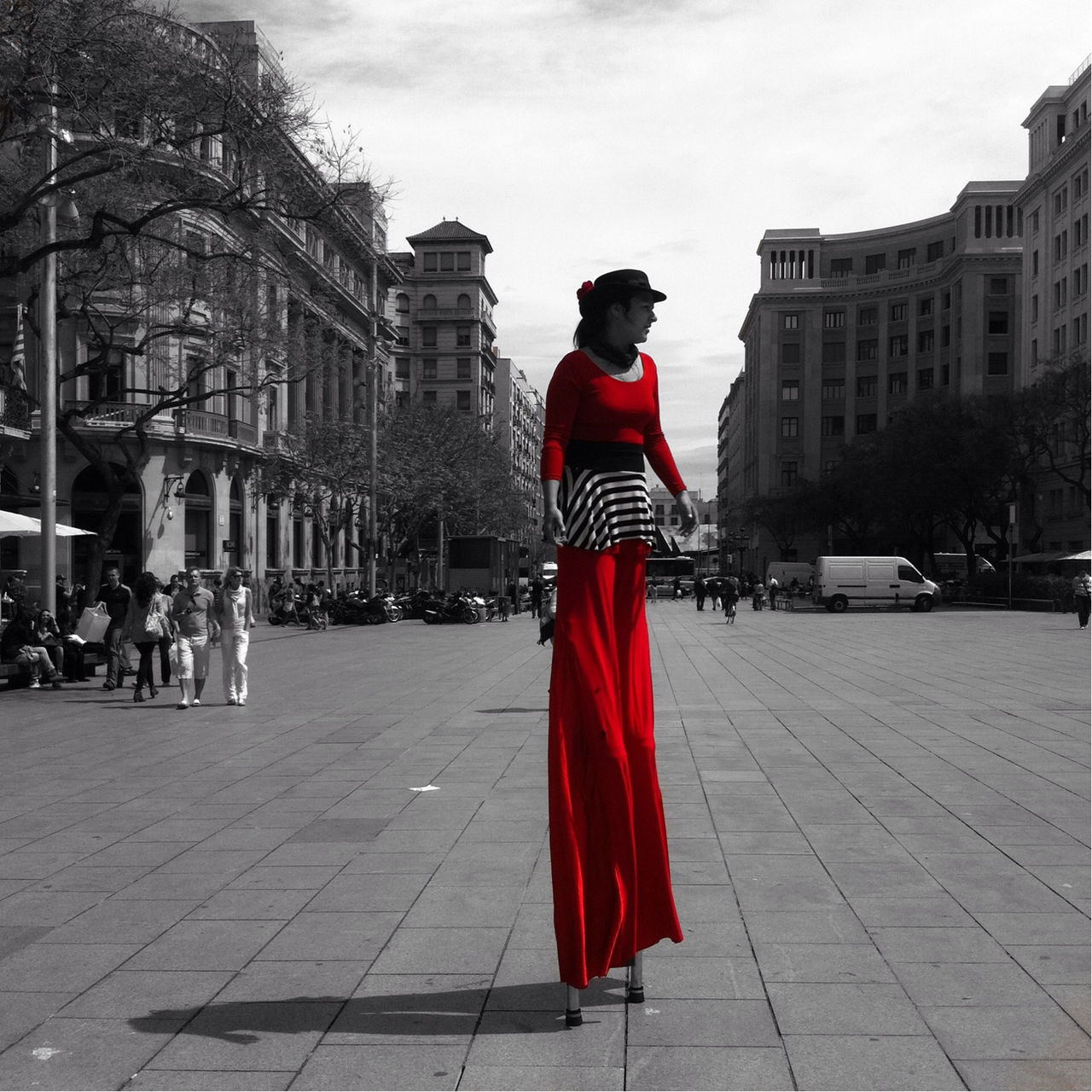 building exterior, architecture, full length, built structure, red, street, lifestyles, city, casual clothing, walking, flag, patriotism, men, rear view, national flag, city life, leisure activity, person