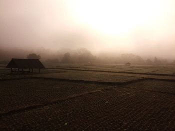 Scenic view of landscape against sky during sunset