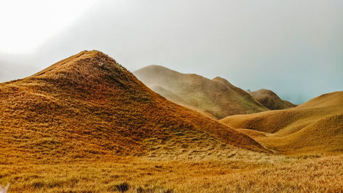 Scenic view of desert against sky