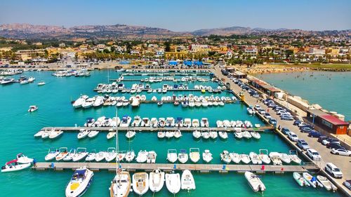 High angle view of boats moored at harbor