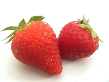 Close-up of strawberry against white background